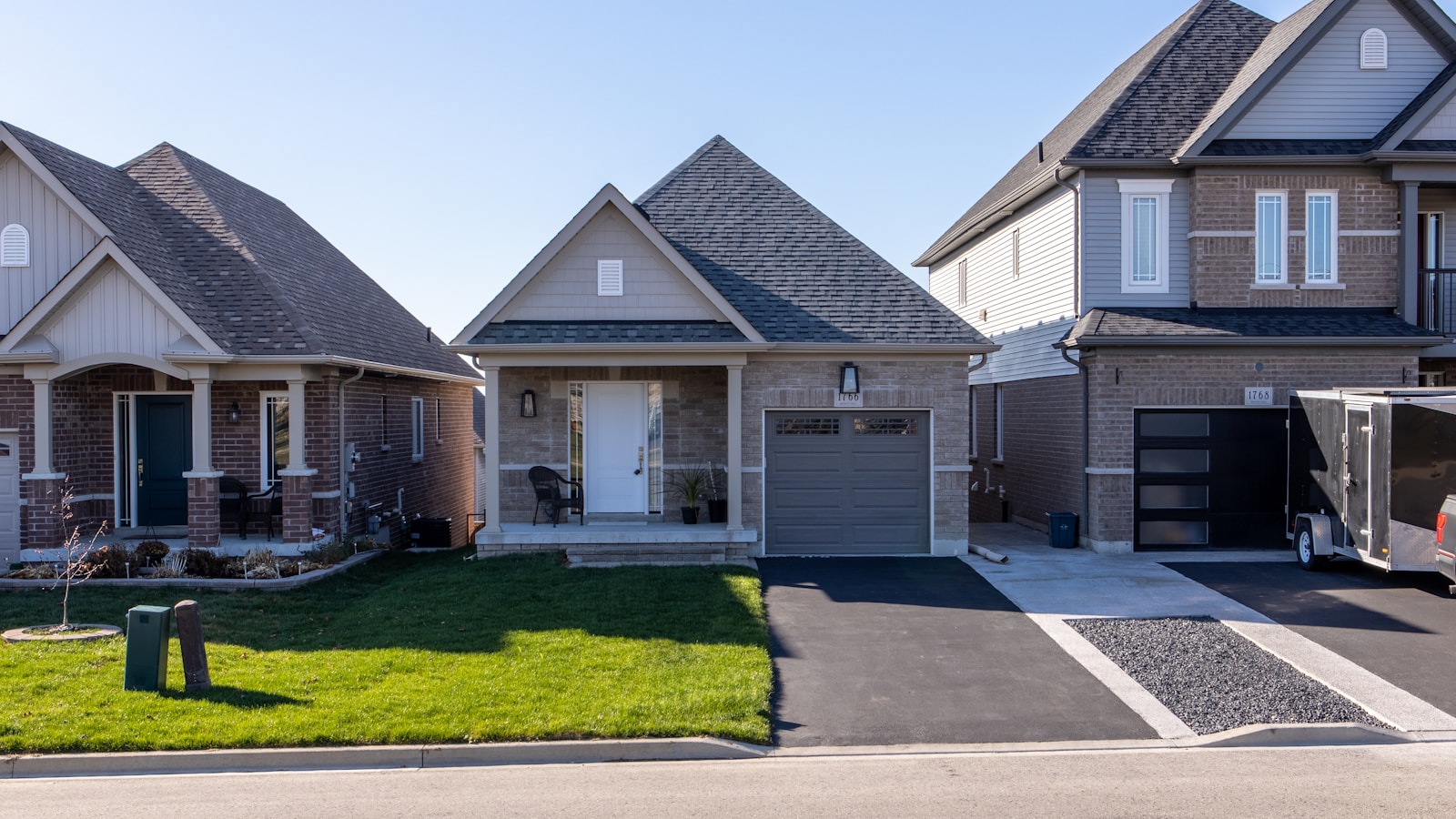 A row of detached homes in a residential neighborhood